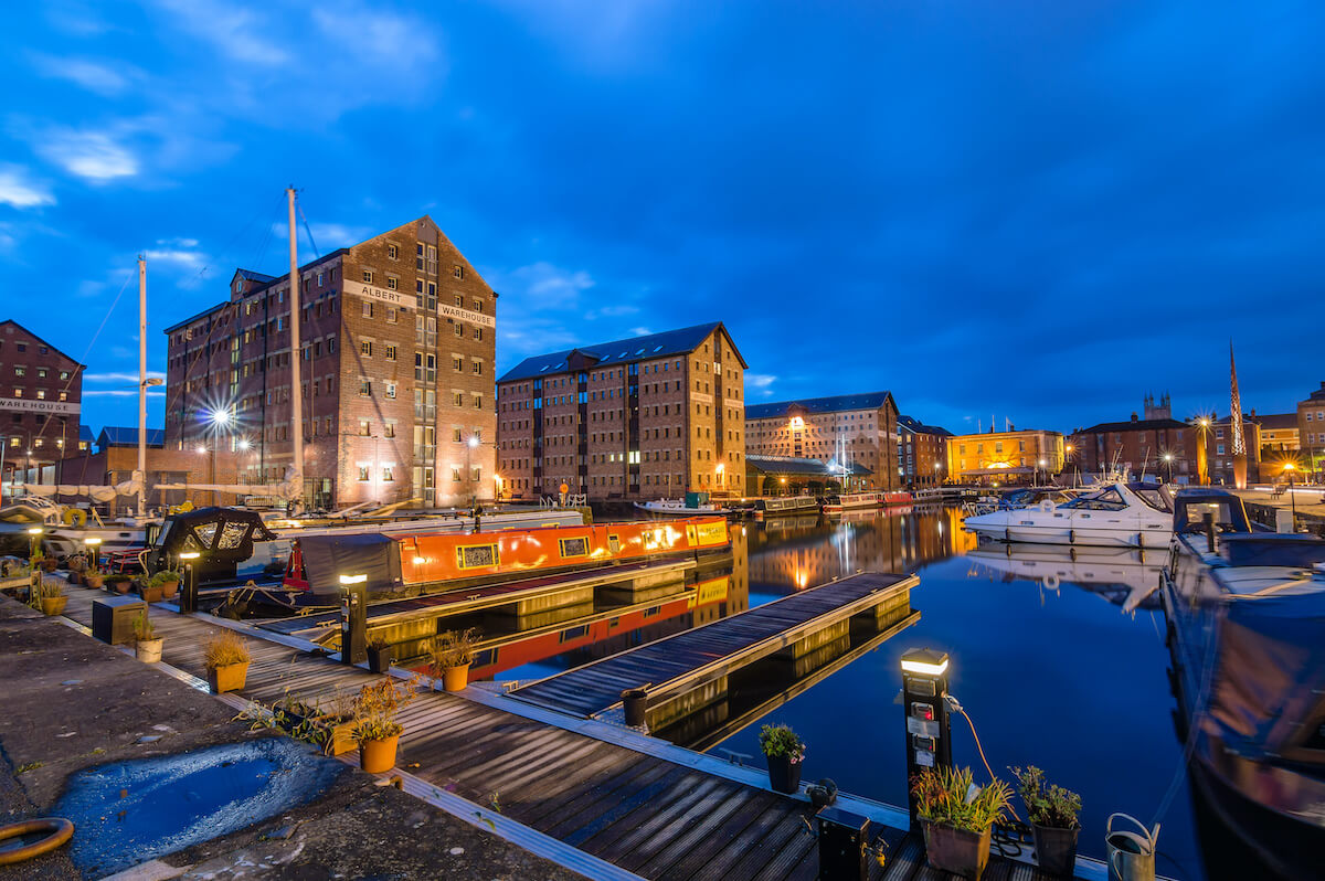 Night image of a harbour with boats docked