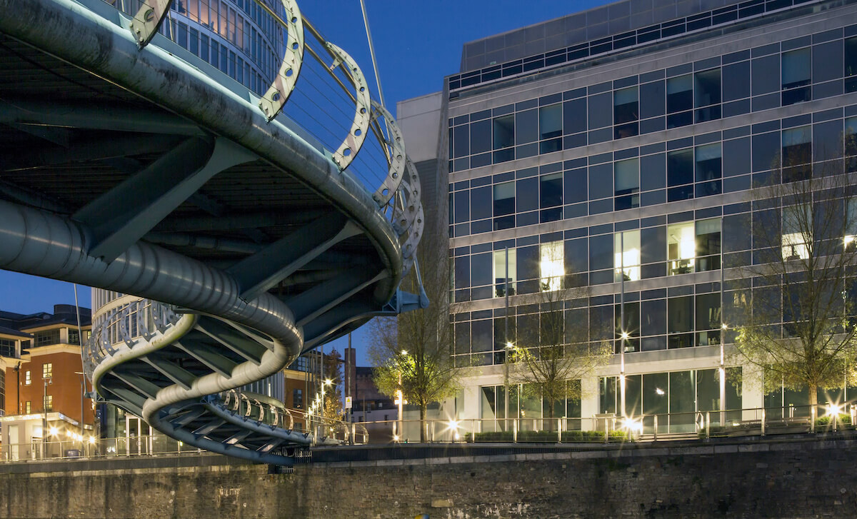 Bridge with a large office building to the right